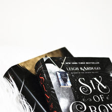 Load image into Gallery viewer, Six of Crows Miniature Book Set Necklace on book