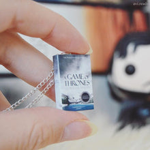 Load image into Gallery viewer, A Games of Thrones miniature book necklace 