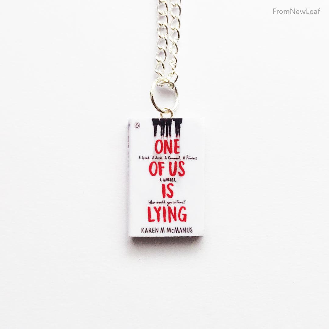 Load image into Gallery viewer, One of us is Lying Miniature Book Necklace Keychain