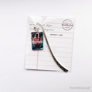The Sleep Over custom miniature book metal bookmark packaged in library card