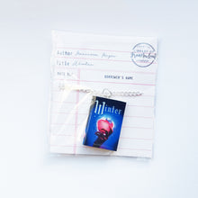 Load image into Gallery viewer, Winter Miniature Book Necklace packaged in library card