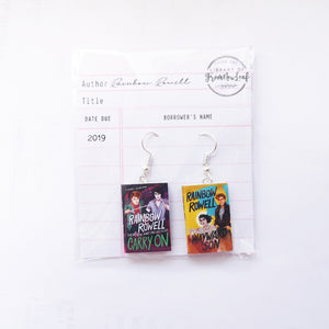 Carry On Wayward Son Miniature Book Earrings fish hooks packaged in library card