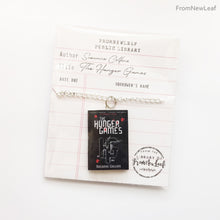 Load image into Gallery viewer, The Hunger Games Catching Fire Mockingjay Suzanne Collins UK Edition Set Miniature Book Necklace Keychain